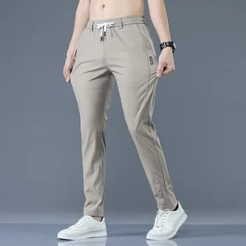 Мужские Корейские Тонкие Классические летние брюки с эластичной резинкой на талии, Модные легкие брюки цвета Хаки, черные стрейчевые Брюки, мужские